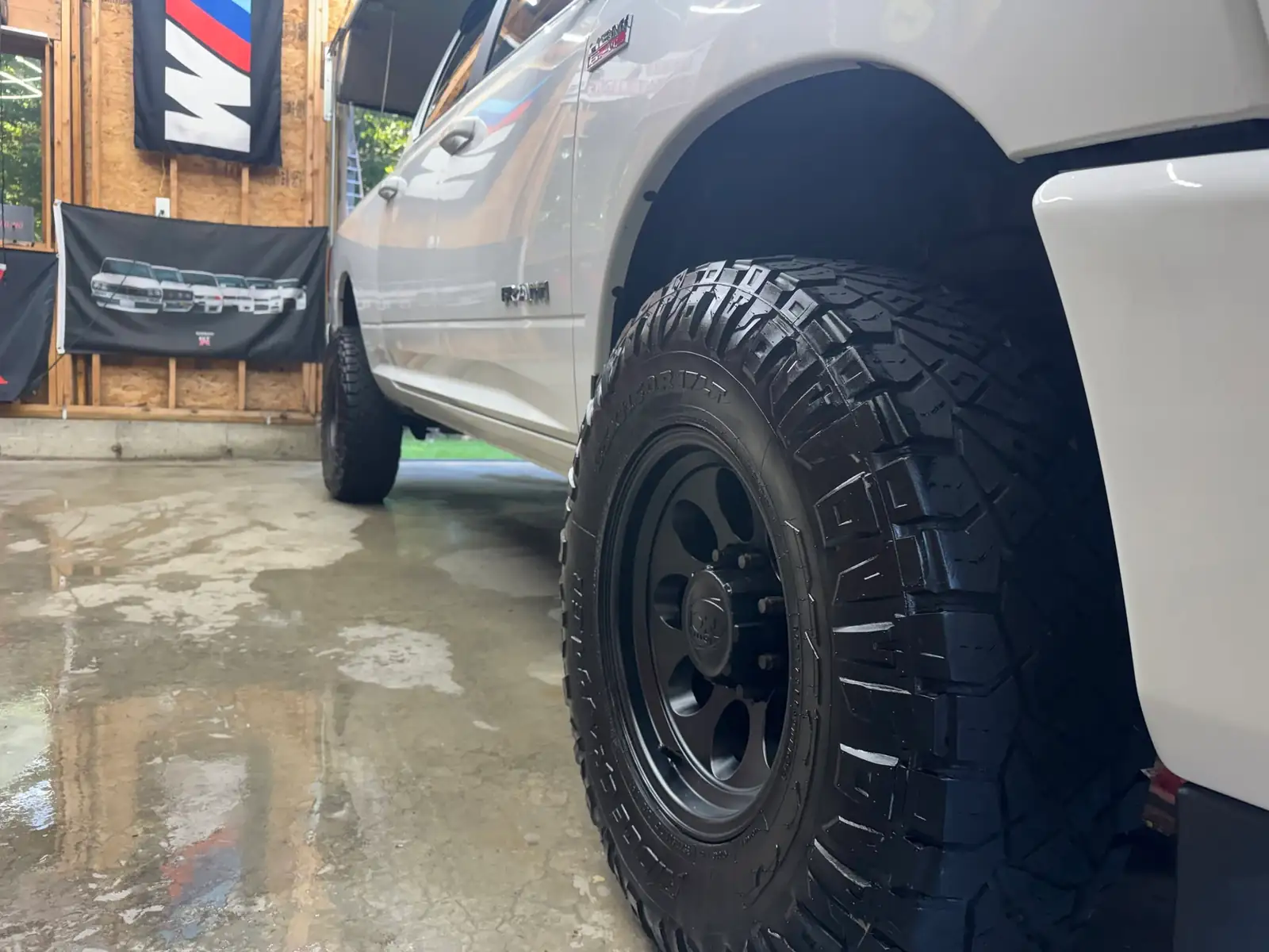 The Ram's black wheel and tire, clean